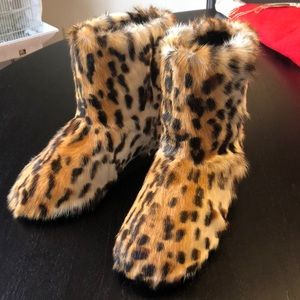 Leopard fur boots from ice queen